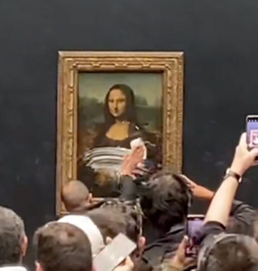 Disguised as old lady, man throws dessert on the Mona Lisa in Louvre