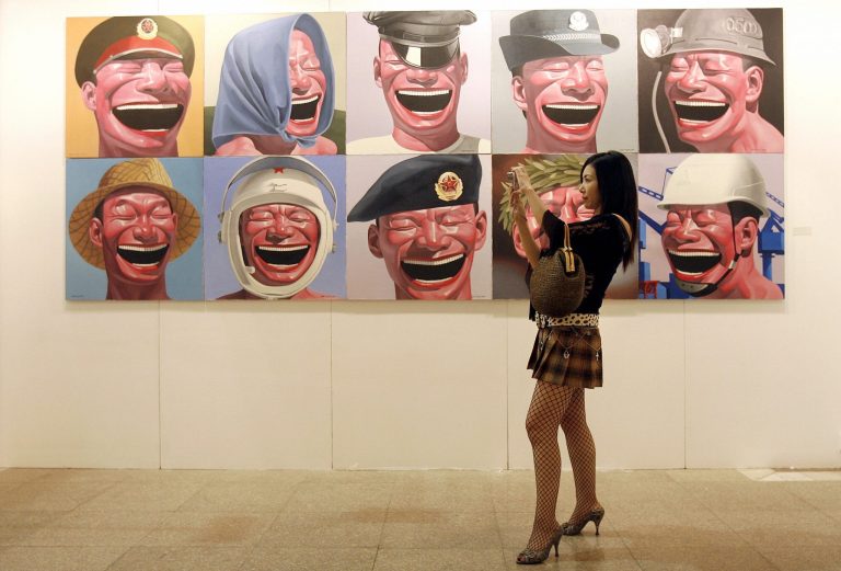 Famous Chinese Artist Yue Minjun is Accused by Internet Netizens of Defaming the Nation with His Iconic “Laughing Man”.