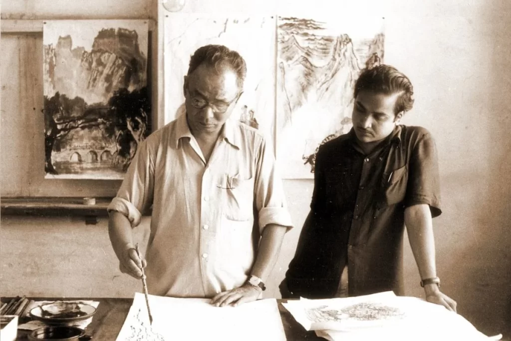 Li Keran a Chinese art maestro Li Keran, visited the studio of Beohar Rammanohar Sinha in Peking in c. 1957. The two artists executed numerous artworks together, including the famous painting ‘‘Meishan Bridge’’ seen hanging in the background. 