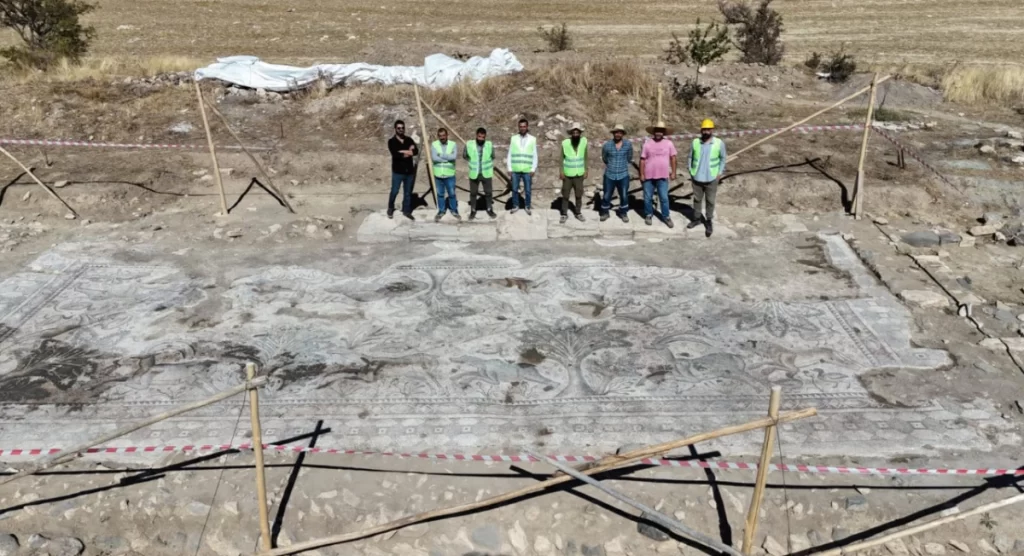 Excavators Standing on the Roman Mosaic