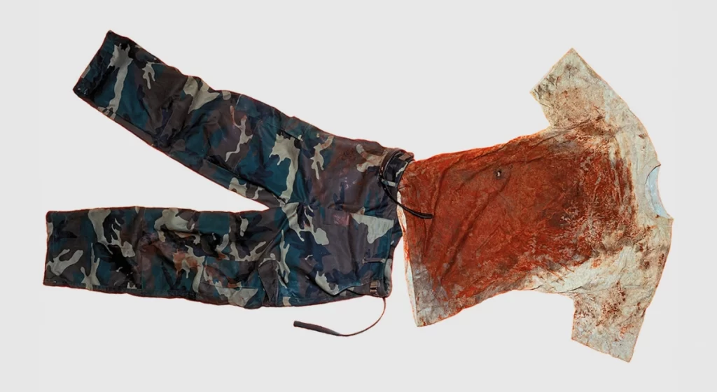 The bloody clothing of a fallen soldier from the Bosnian war, depicted on a Benetton poster 